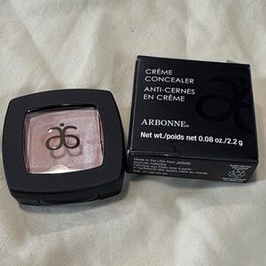 Arbonne Crème Concealer in Black Compact. Light. NIB.